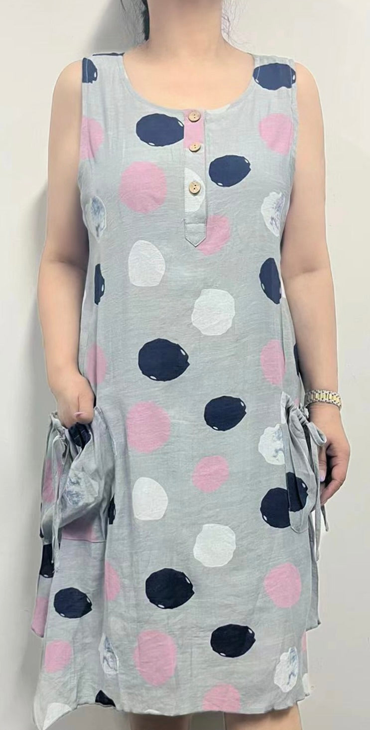 Sleeveless Dress with Fun Pockets and Button Front Detail